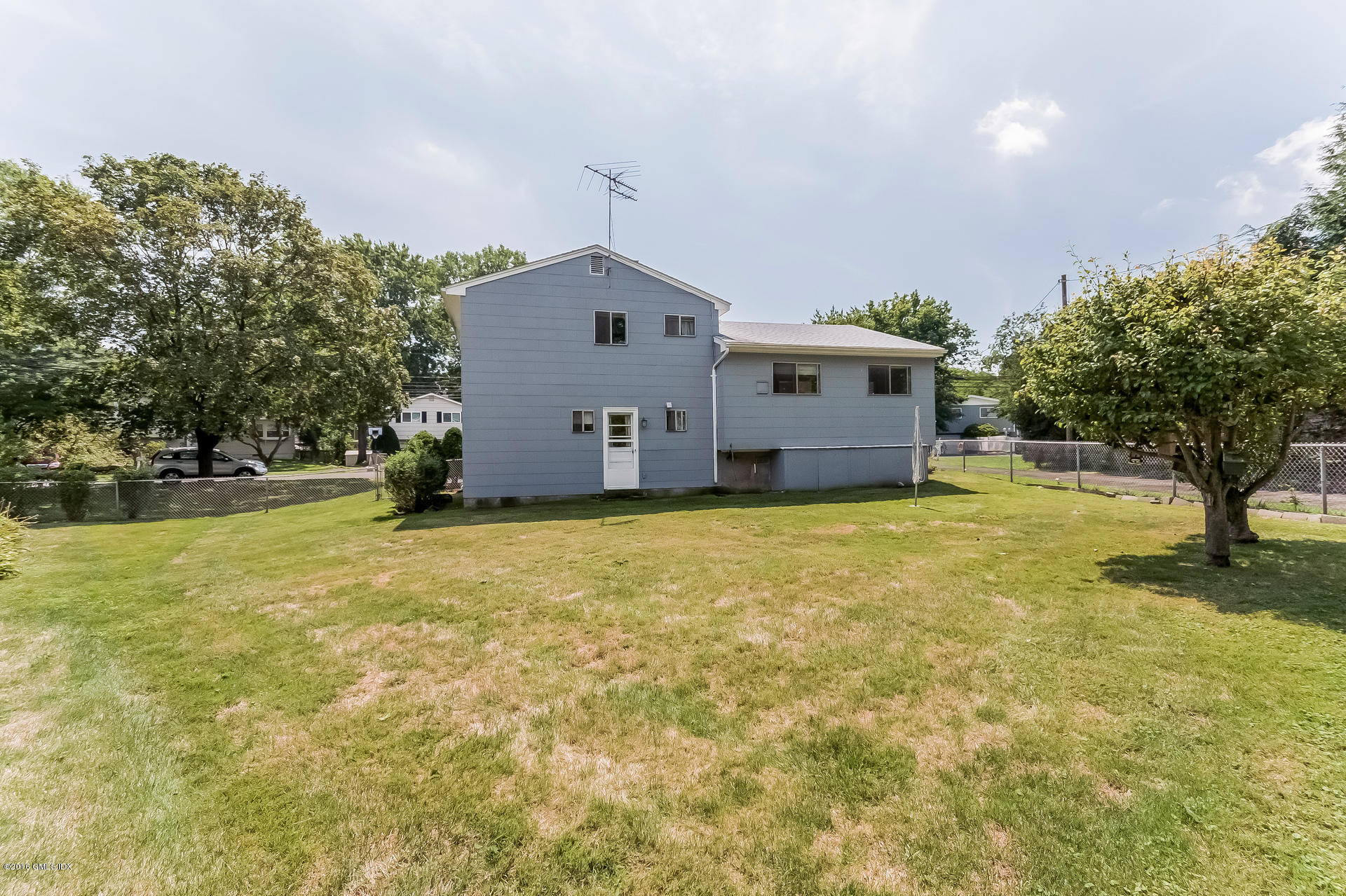 15 Amherst Road Riverside, CT 06878 - Photo 24 of 27 a view of a house with a yard