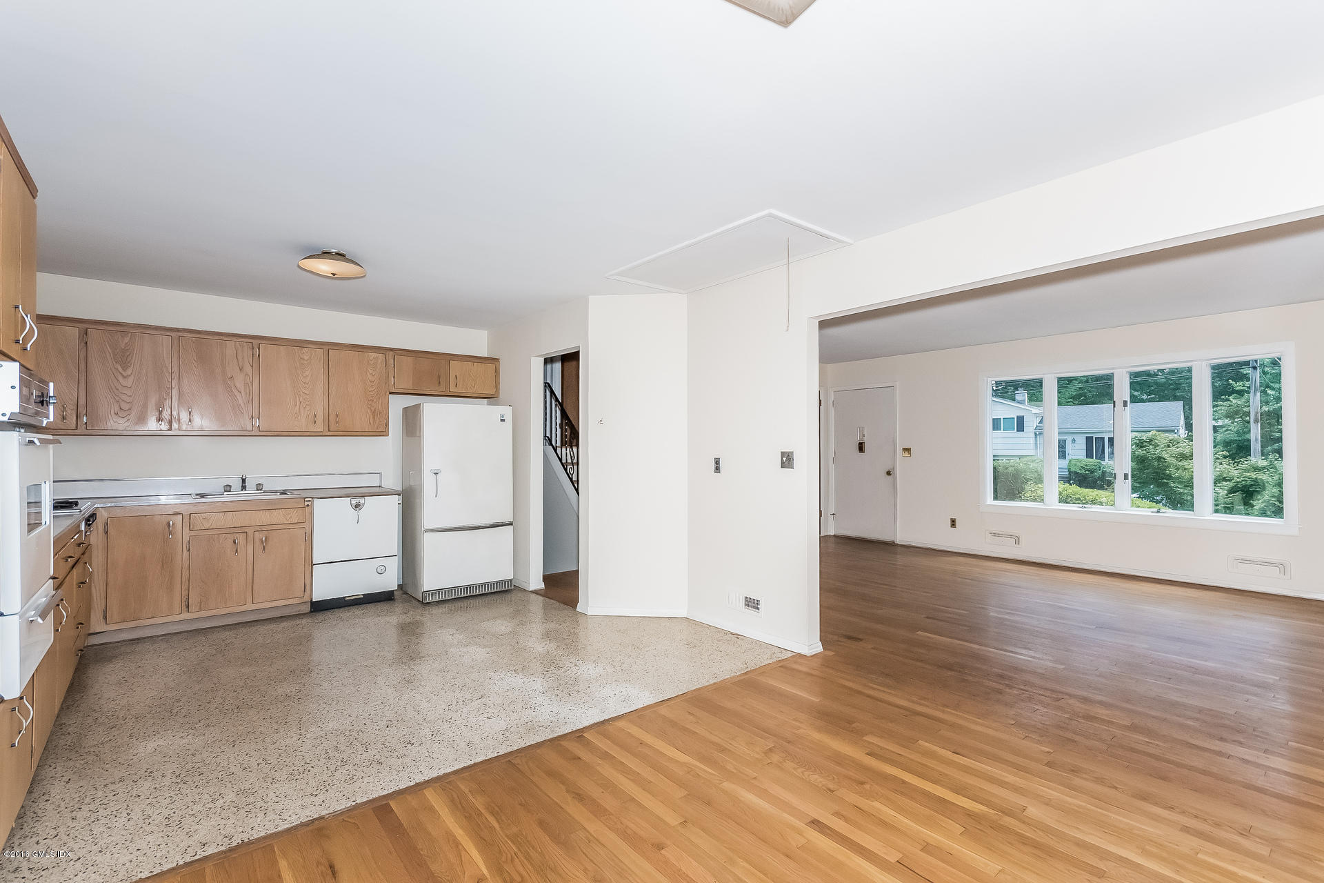 15 Amherst Road Riverside, CT 06878 - Photo 7 of 27 a view of a kitchen with a sink cabinets and a window