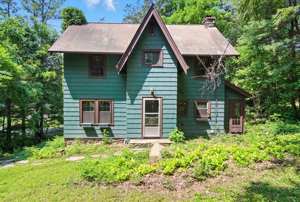 75 Reservation Road Holyoke, MA 01040 - Photo 1 of 1 a front view of a house with garden