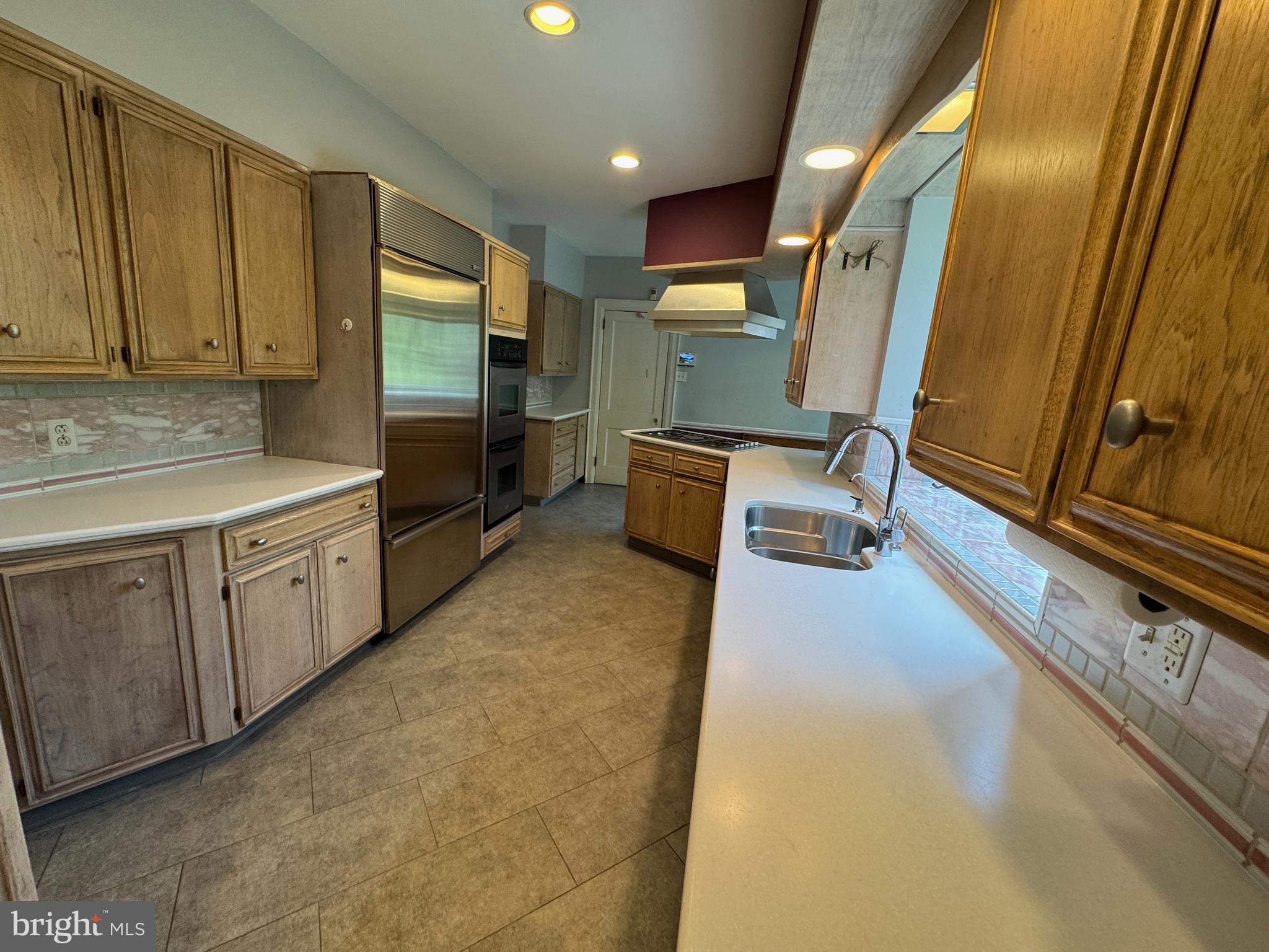 1217 Medford Road Wynnewood, PA 19096 - Photo 15 of 92 Corian Counters & Recessed Lighting