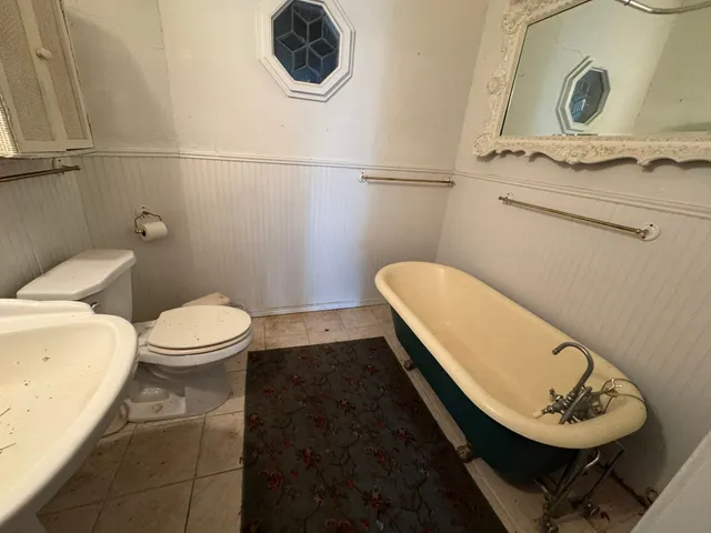 a view of a hallway with washer and dryer