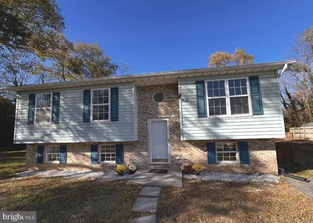a front view of a house with a patio