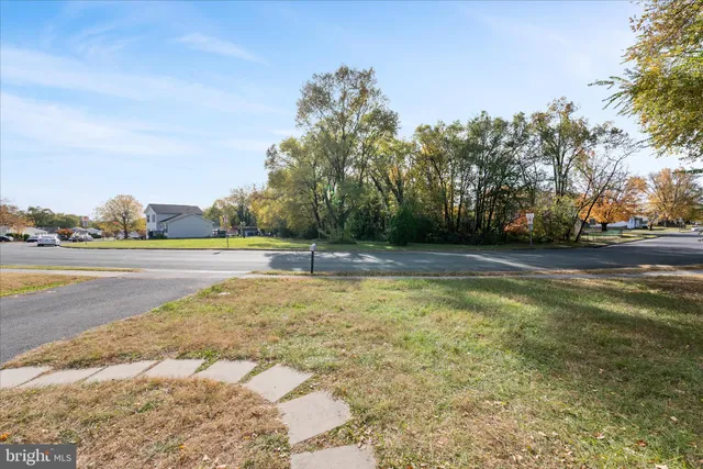 a view of a swimming pool and an outdoor space
