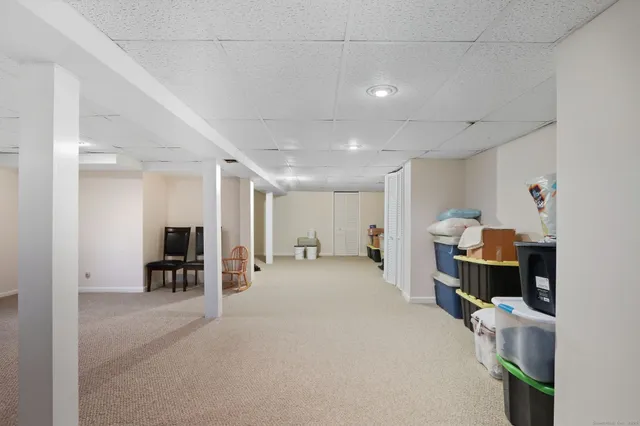 a room with furniture and a flat screen tv