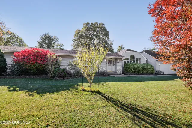 front view of a house and a yard