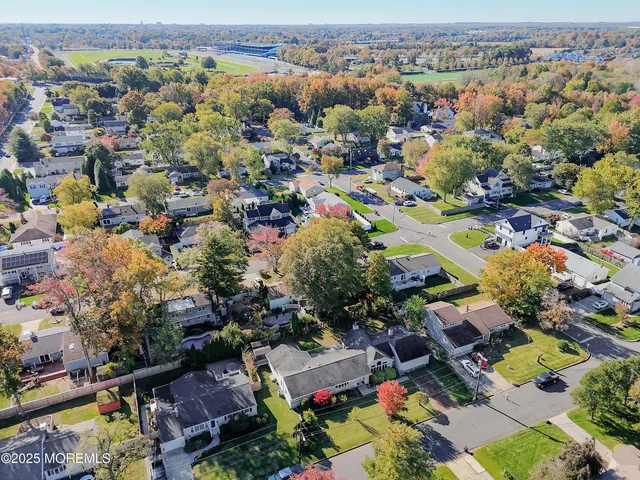 a view of a house with a yard and plants