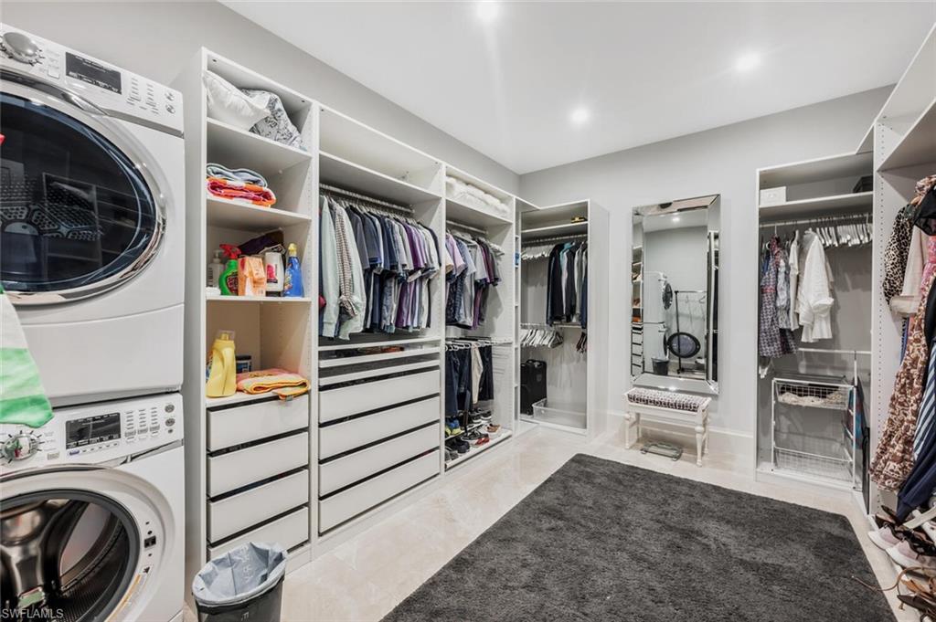 1844 Alamanda Drive Naples, FL 34102 - Photo 25 of 50 Primary Closet with Washer and Dryer