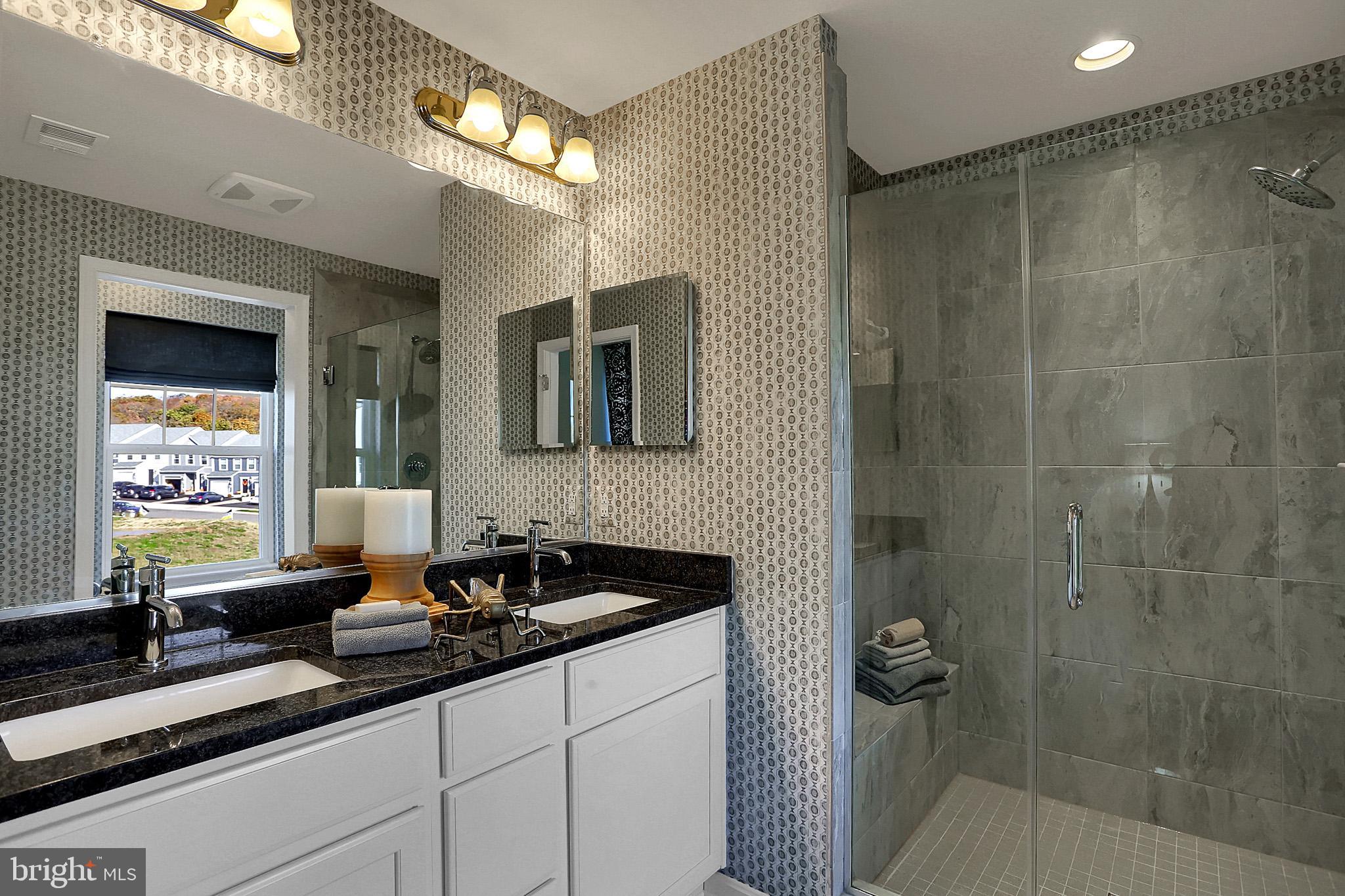 111 Nell Street Perryville, MD 21903 - Photo 15 of 22 a bathroom with a sink and a mirror