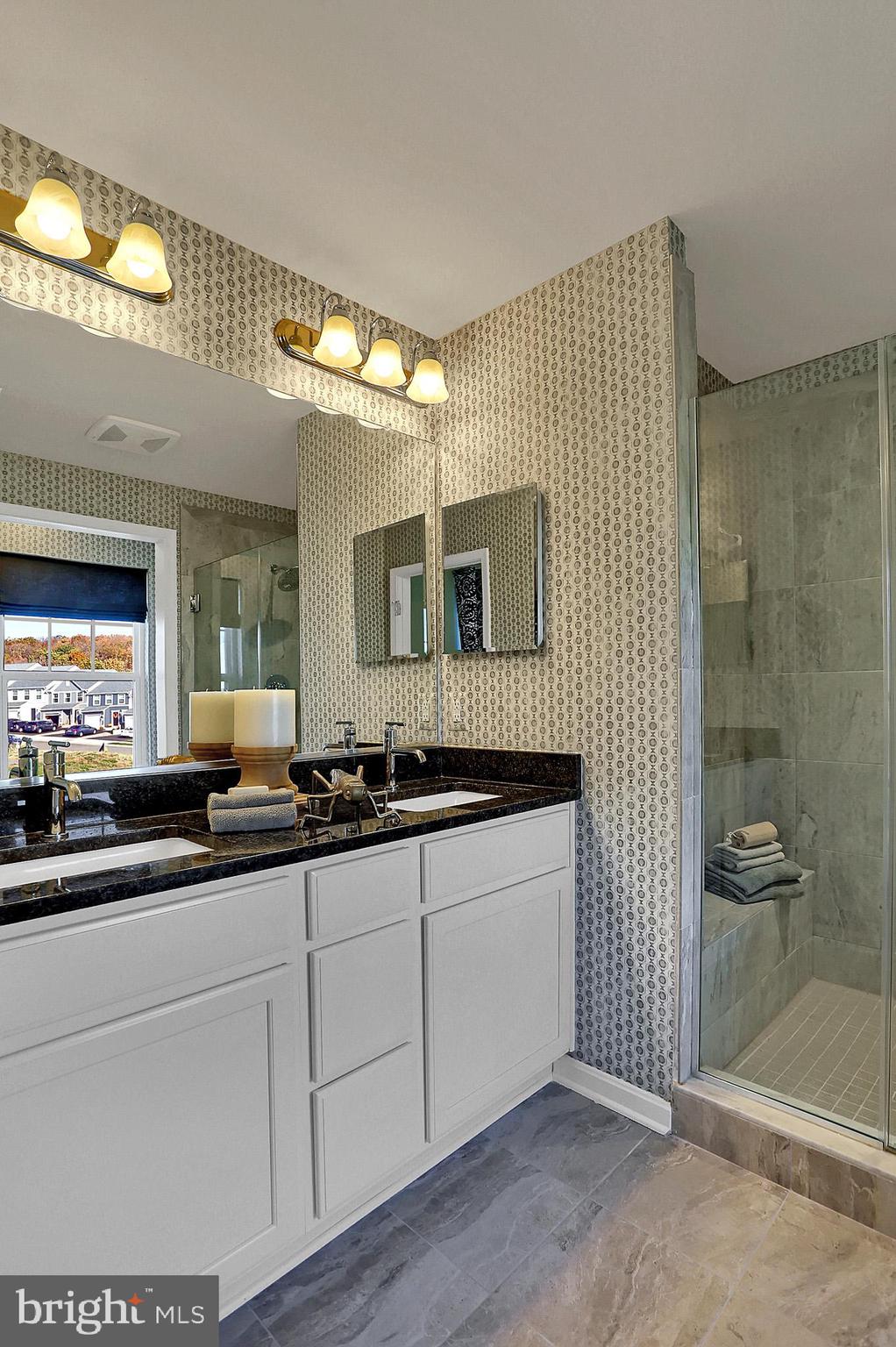 111 Nell Street Perryville, MD 21903 - Photo 16 of 22 a bathroom with a sink and a mirror