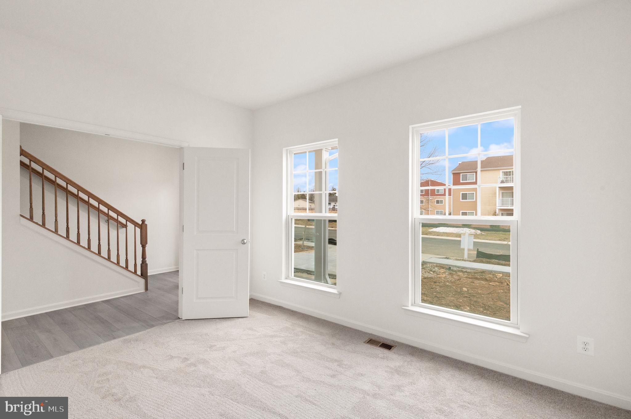 111 Nell Street Perryville, MD 21903 - Photo 21 of 29 a view of an empty room with windows