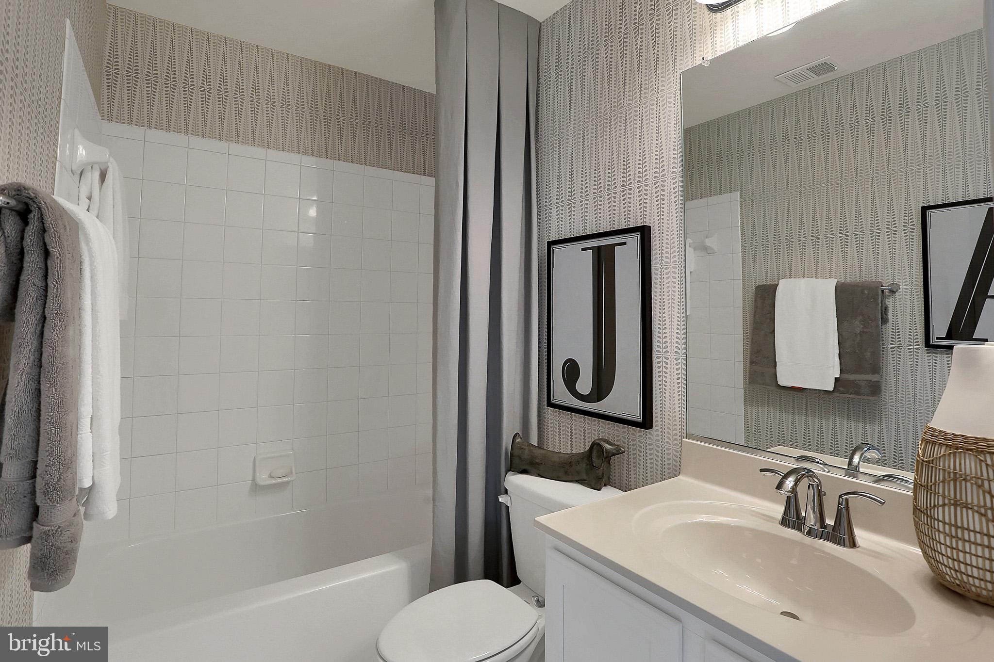 111 Nell Street Perryville, MD 21903 - Photo 2 of 22 a bathroom with a sink toilet and shower