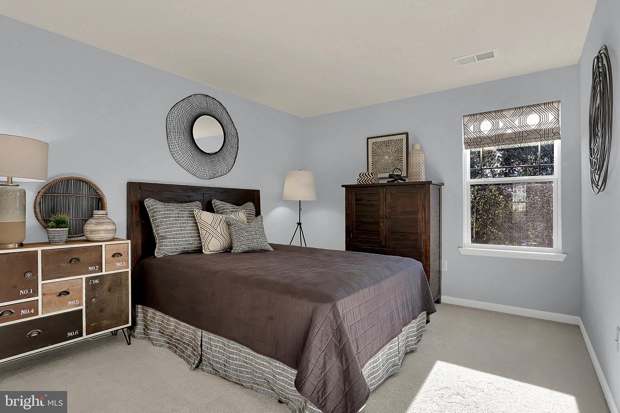 111 Nell Street Perryville, MD 21903 - Photo 6 of 22 a bedroom with a bed and window