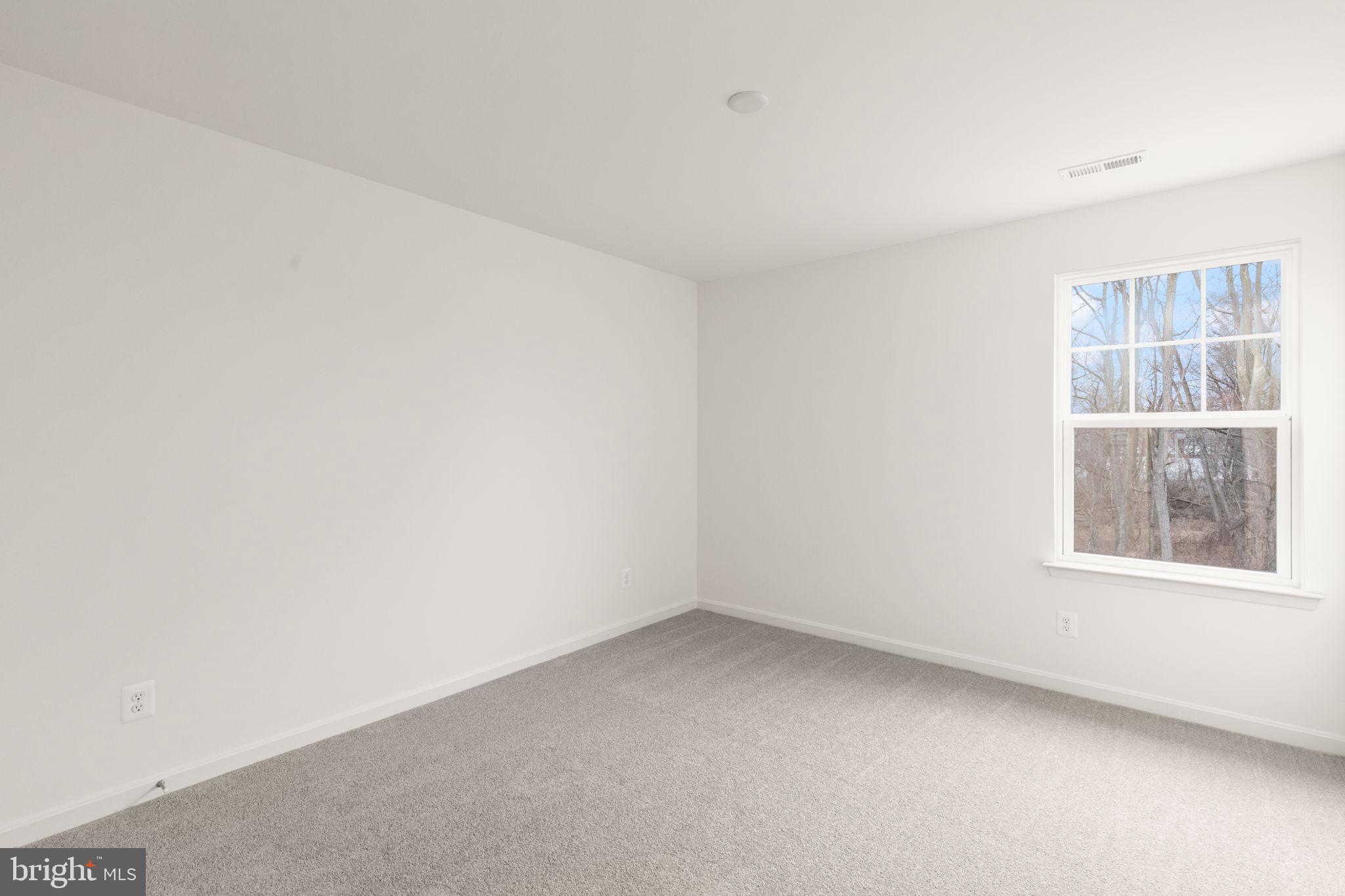 111 Nell Street Perryville, MD 21903 - Photo 7 of 29 an empty room with a window