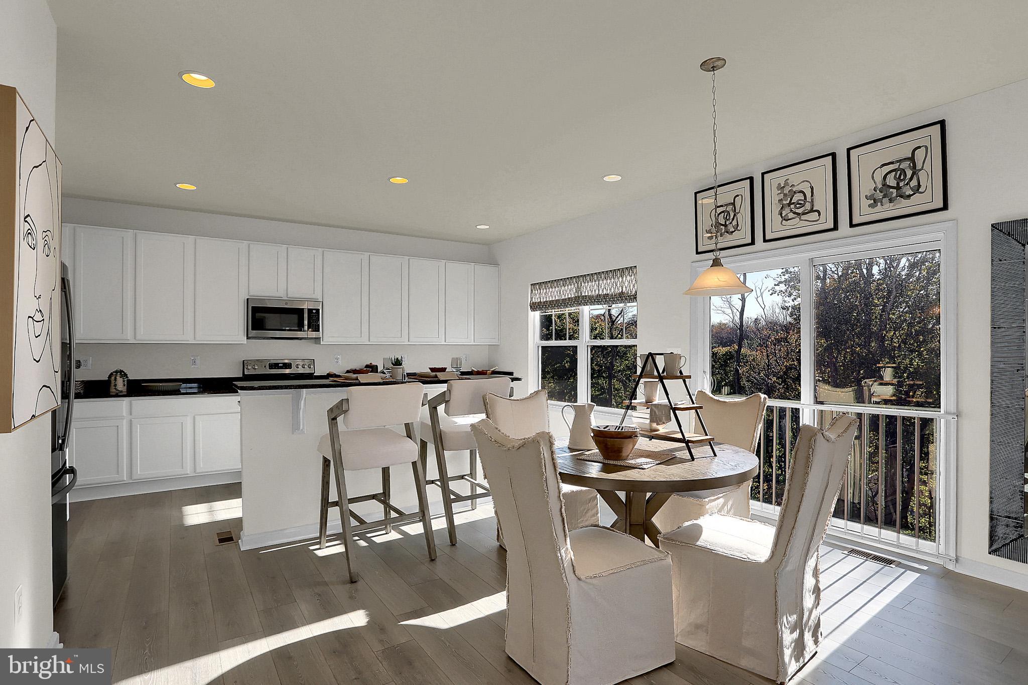 111 Nell Street Perryville, MD 21903 - Photo 8 of 22 a view of a dining room with furniture window and outside view