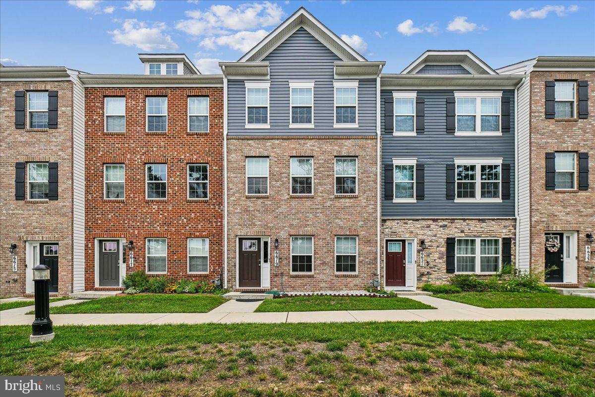 6619 Darter Way Clinton, MD 20735 - Photo 1 of 20 Modern Three-Level Townhome Exterior