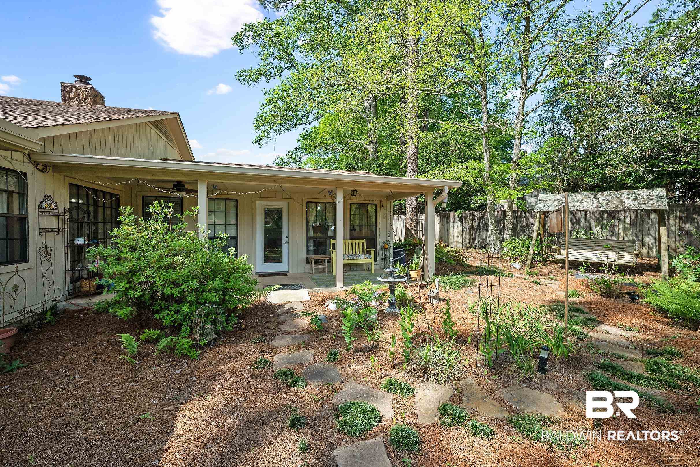 4026 Kingsrow Row Mobile, AL 36619 - Photo 43 of 51 View of yard featuring ceiling fan and covered porch