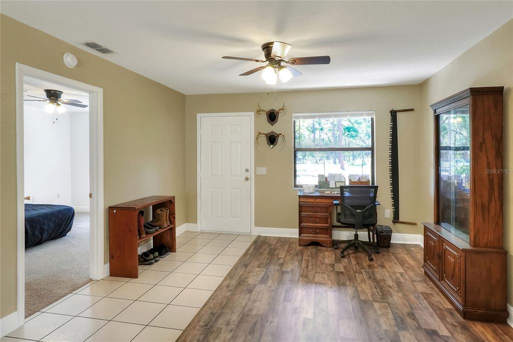 4846 Knights Station Road Lakeland, FL 33810 - Photo 14 of 49 a living room with furniture and a window