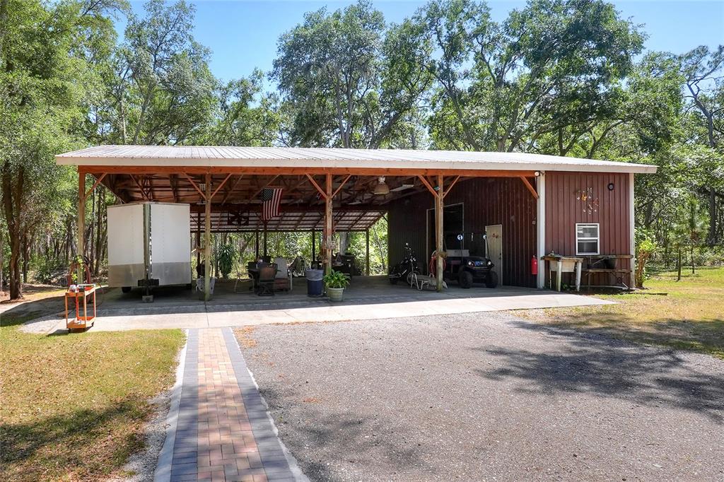 4846 Knights Station Road Lakeland, FL 33810 - Photo 2 of 49 a front view of a house with garden
