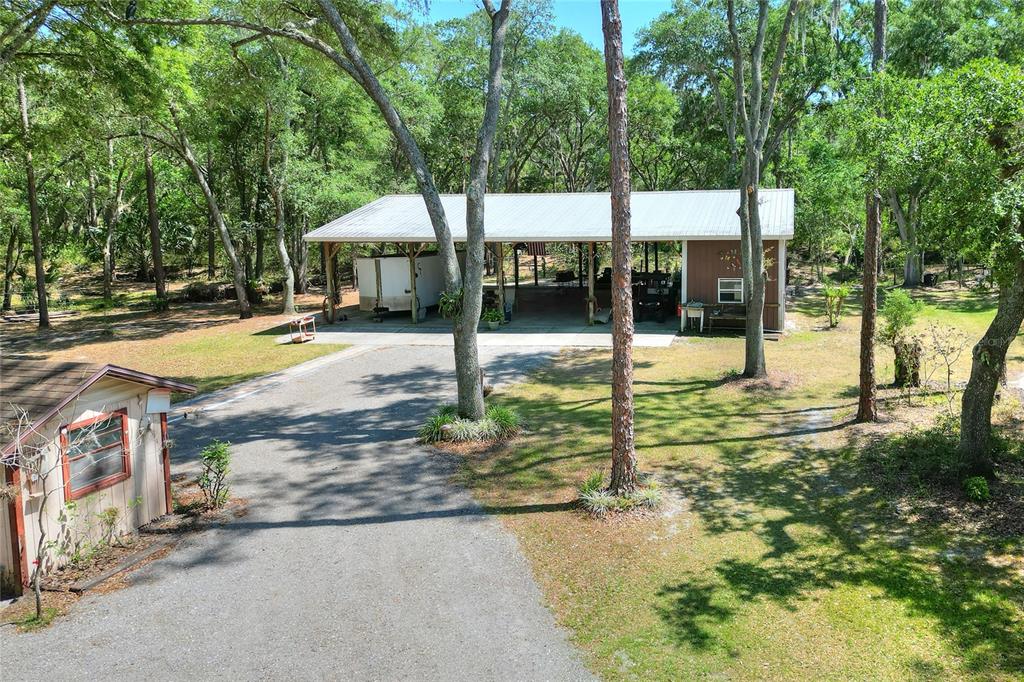 4846 Knights Station Road Lakeland, FL 33810 - Photo 39 of 49 a view of a swimming pool with a patio