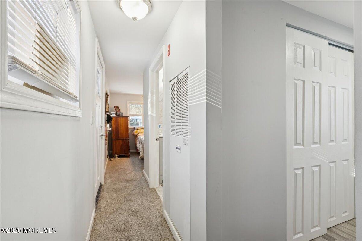 57 Roberts Road Toms River, NJ 08755 - Photo 14 of 14 a view of a hallway with wooden floor and entryway