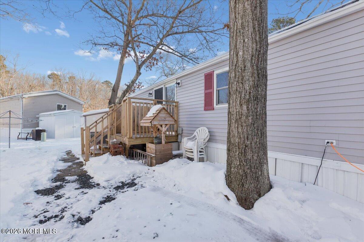 57 Roberts Road Toms River, NJ 08755 - Photo 5 of 14 a view of a house with a snow in the yard