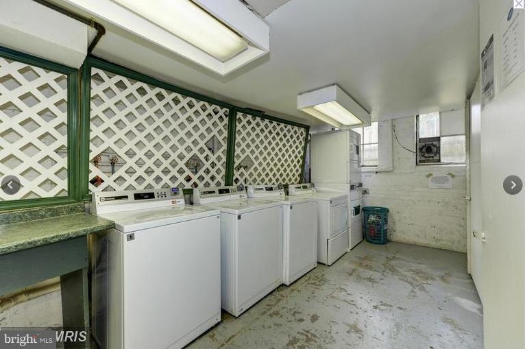 30 South Old Glebe Road, Unit 302E Arlington, VA 22204 - Photo 14 of 21 a kitchen with a sink and cabinets