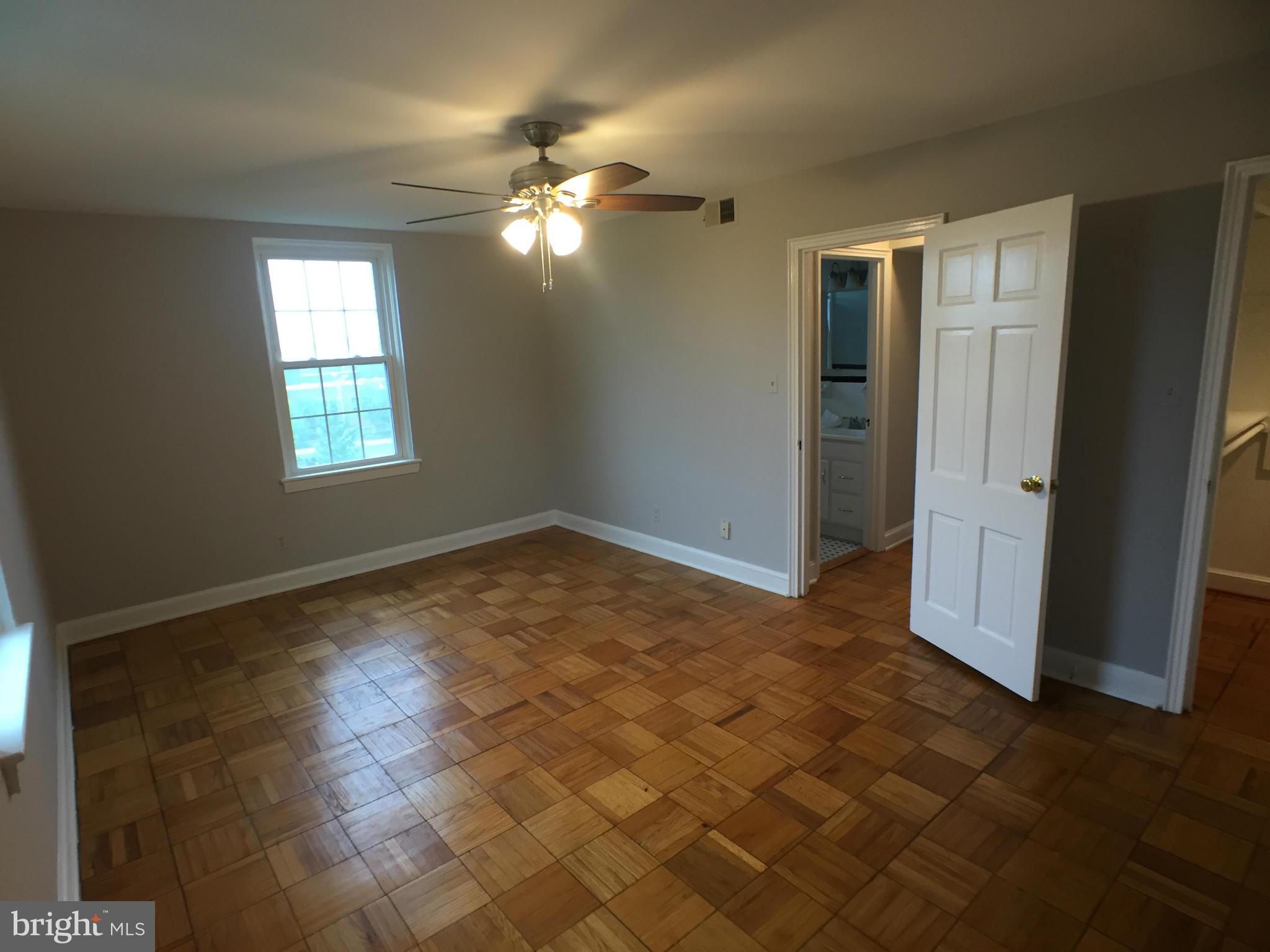 30 South Old Glebe Road, Unit 302E Arlington, VA 22204 - Photo 7 of 21 an empty room with windows and closet