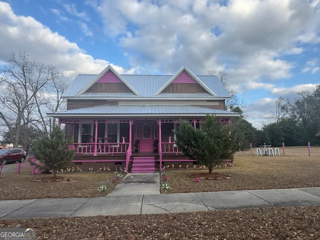 a front view of a house with porch