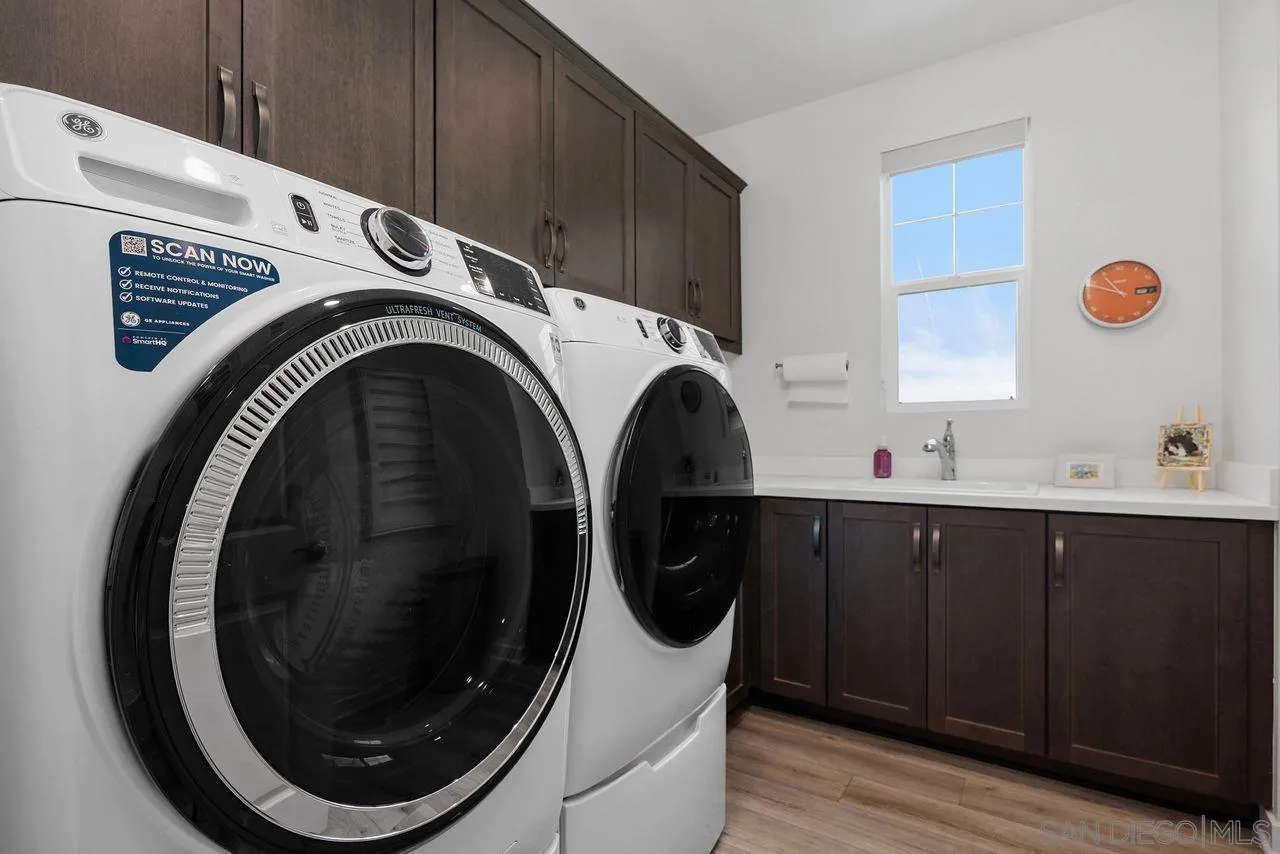 565 Townsend Way San Marcos, CA 92078 - Photo 22 of 33 a utility room with dryer and washer