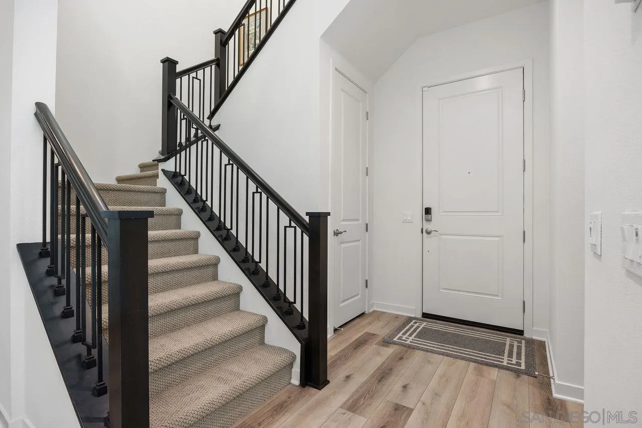 565 Townsend Way San Marcos, CA 92078 - Photo 3 of 33 a view of an entryway with wooden floor