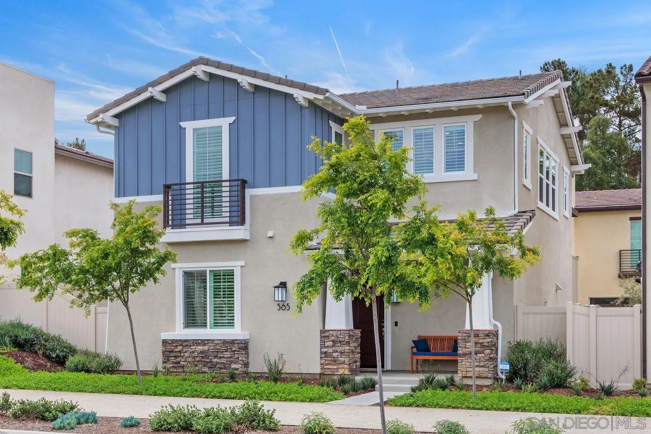 565 Townsend Way San Marcos, CA 92078 - Photo 31 of 33 a front view of a house with a yard and a garage