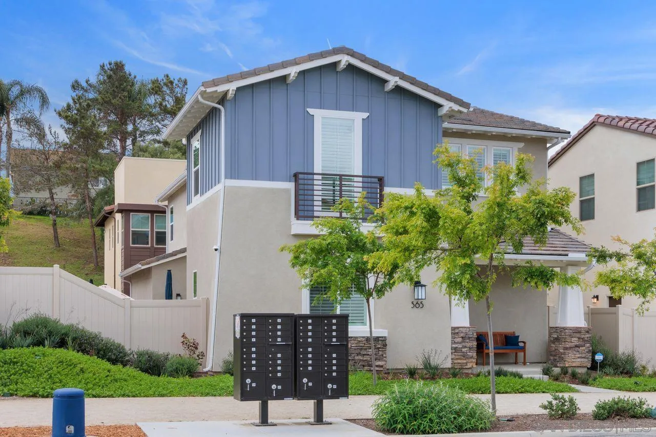 565 Townsend Way San Marcos, CA 92078 - Photo 33 of 33 a front view of a house with a yard and garage