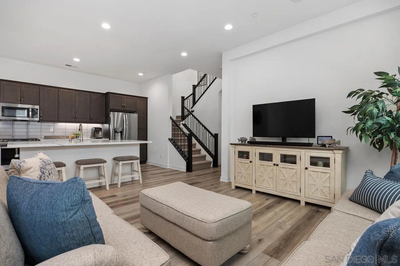565 Townsend Way San Marcos, CA 92078 - Photo 6 of 33 a living room with furniture and a flat screen tv