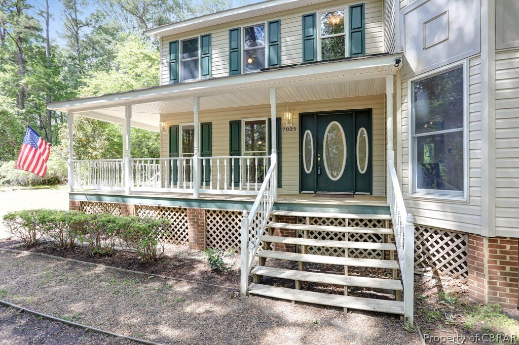 7025 Mumford Cove Road Hayes, VA 23072 - Photo 35 of 43 Wrap around front porch