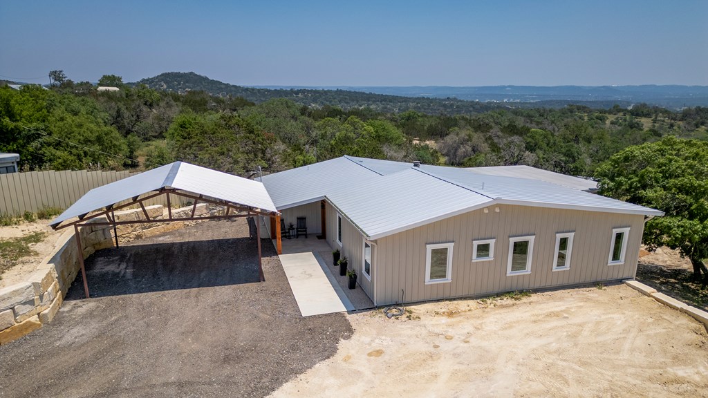 111 Stoney Hills Road Center Point, TX 78010 - Photo 13 of 61 a aerial view of a house next to a yard