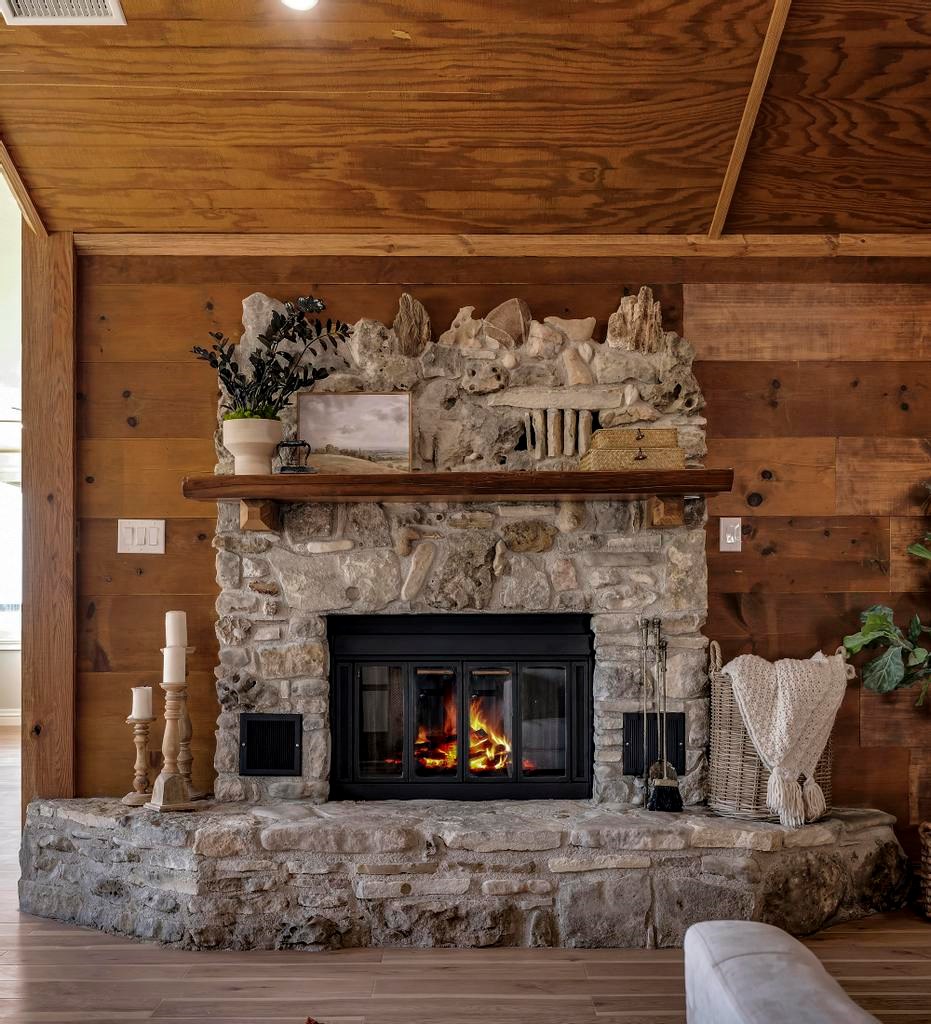 111 Stoney Hills Road Center Point, TX 78010 - Photo 20 of 61 a living room with a fireplace