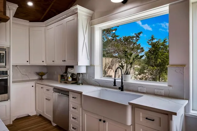 a view of storage and utility room with washer and dryer