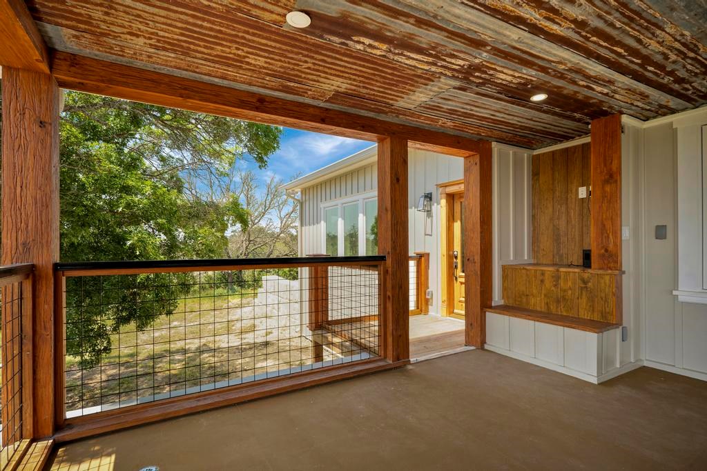 111 Stoney Hills Road Center Point, TX 78010 - Photo 50 of 61 a view of an empty room with a large window