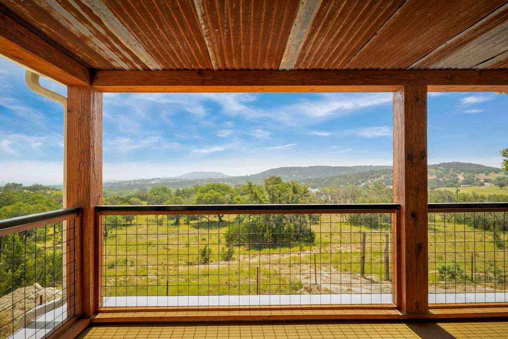 111 Stoney Hills Road Center Point, TX 78010 - Photo 52 of 61 a view of a lake from a window