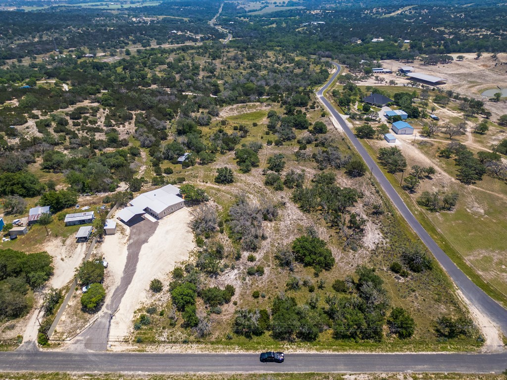 111 Stoney Hills Road Center Point, TX 78010 - Photo 9 of 61 an aerial view of residential houses with outdoor space