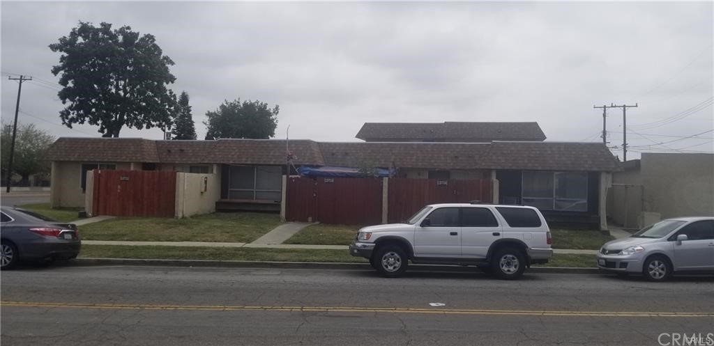 a car parked in front of a house