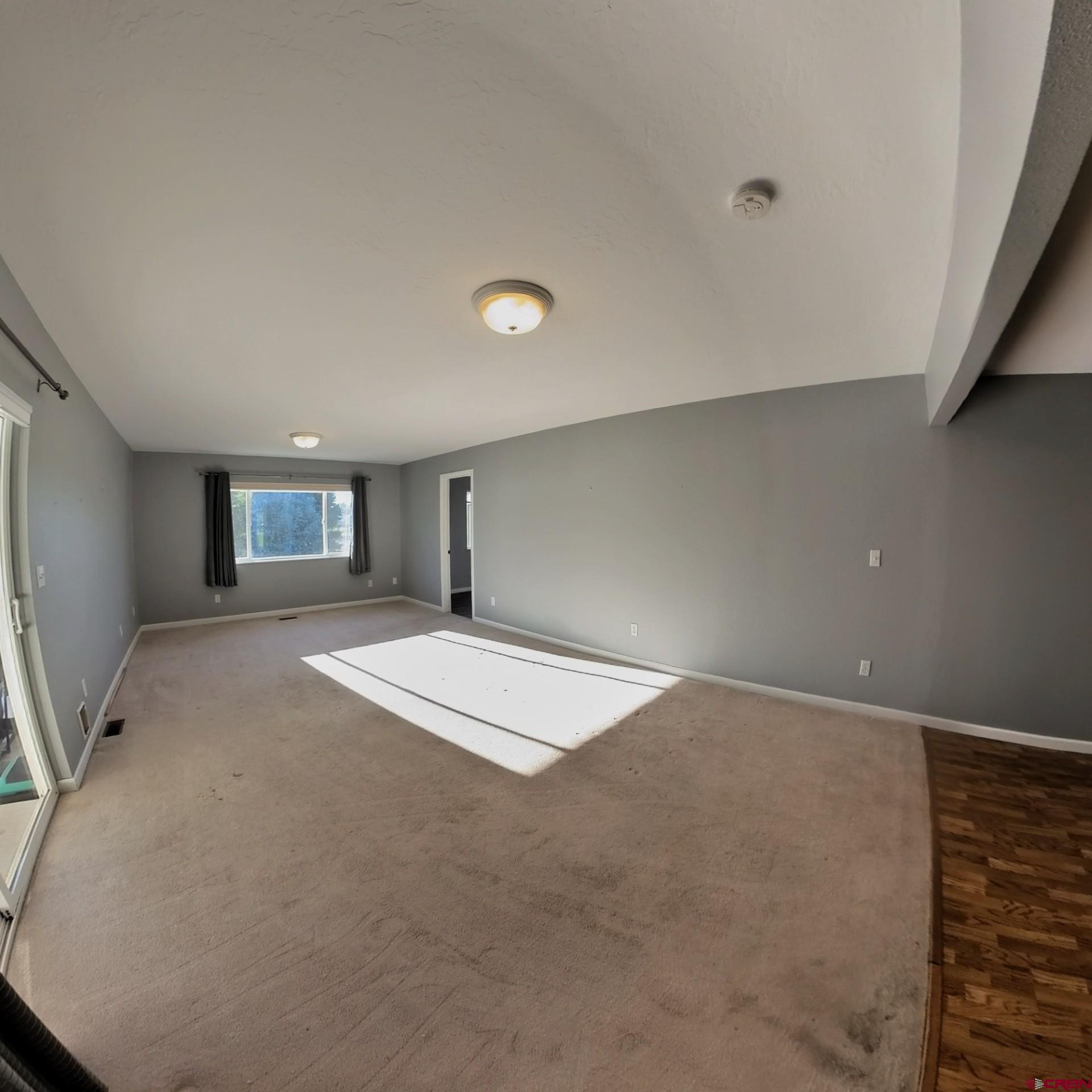 215 Southwest 8th Circle Cedaredge, CO 81413 - Photo 18 of 30 a view of an empty room with window