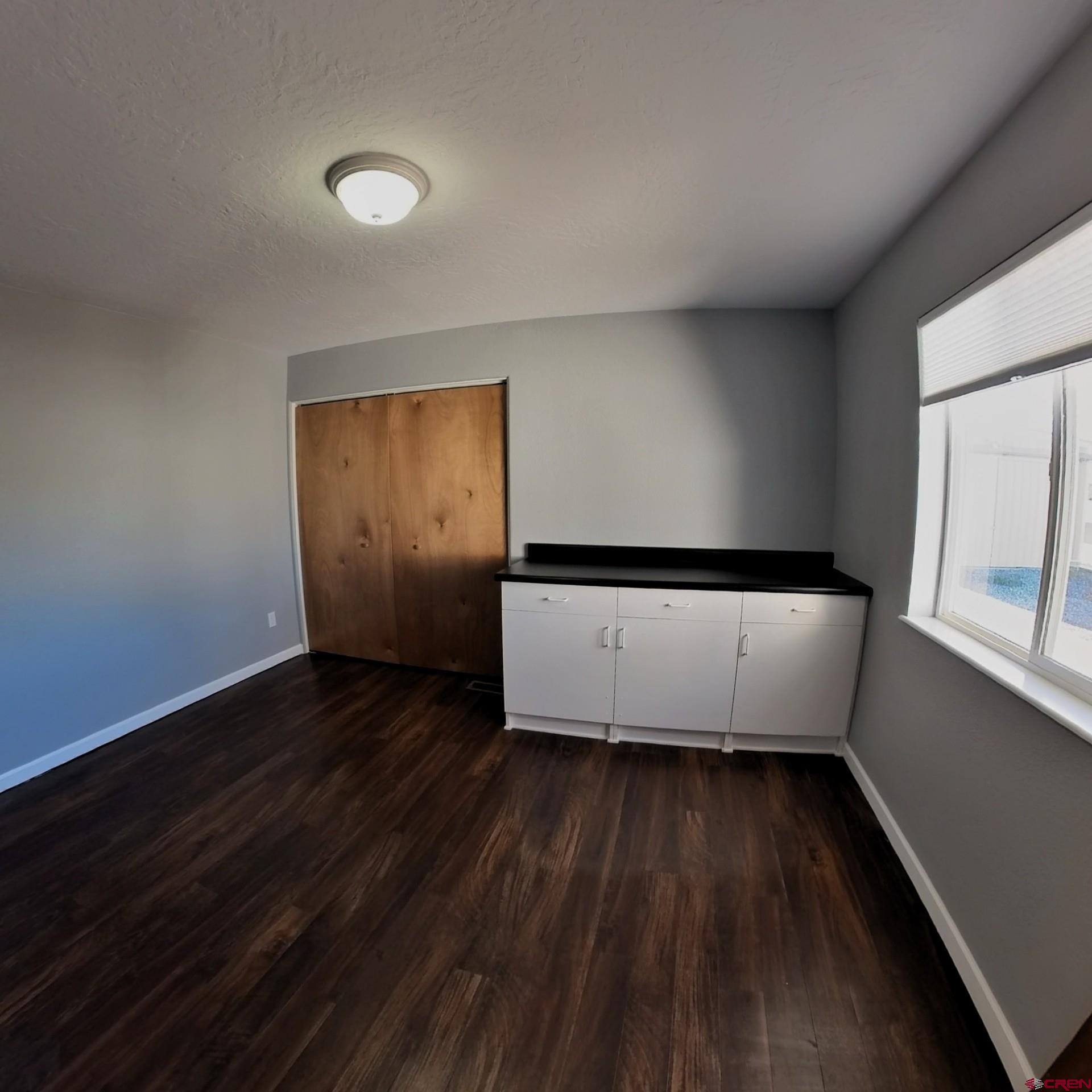 215 Southwest 8th Circle Cedaredge, CO 81413 - Photo 25 of 30 a view of wooden floor in a room