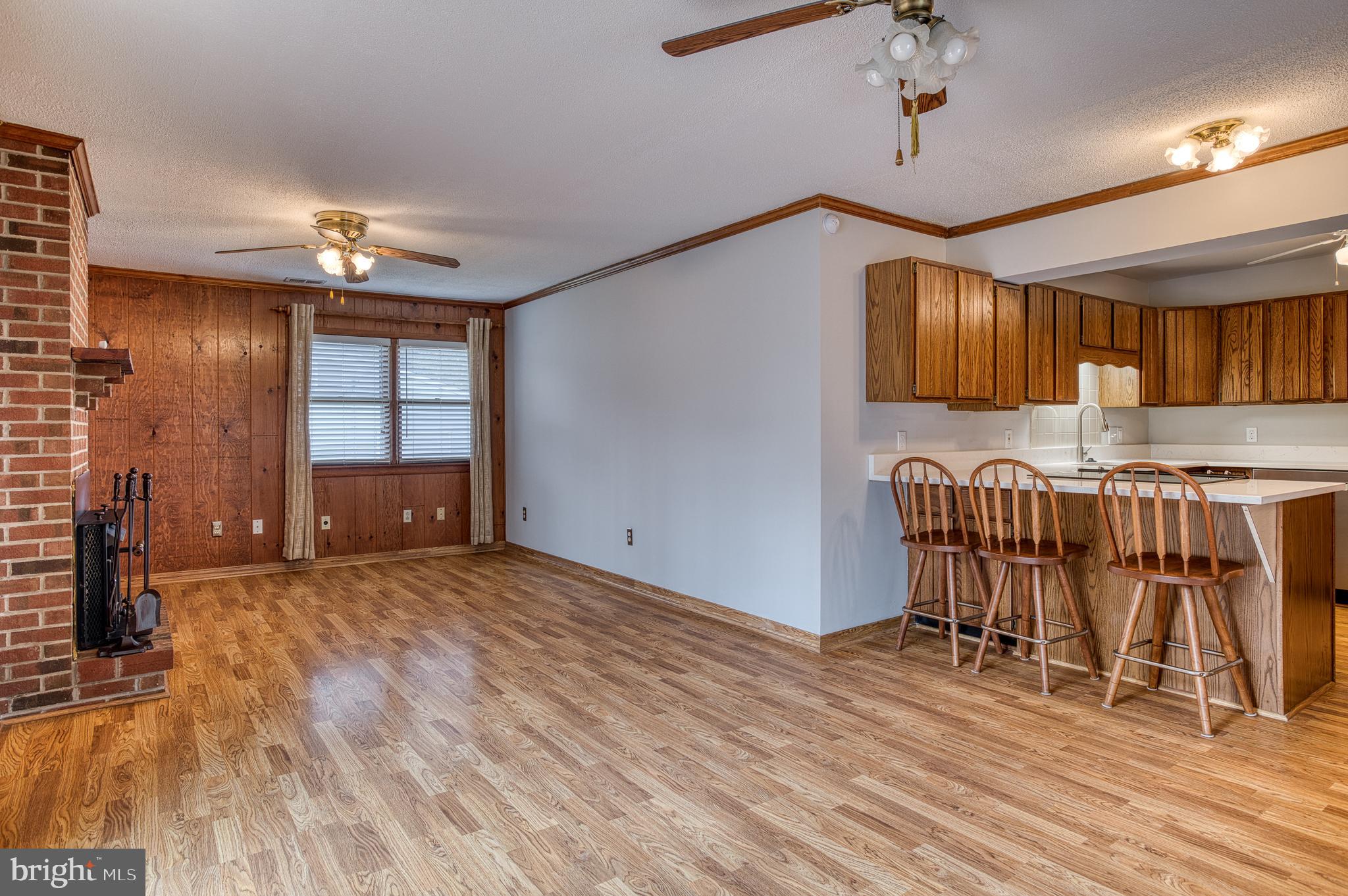 3565 Maple Street Dumfries, VA 22026 - Photo 12 of 36 a view of kitchen with furniture and a chandelier