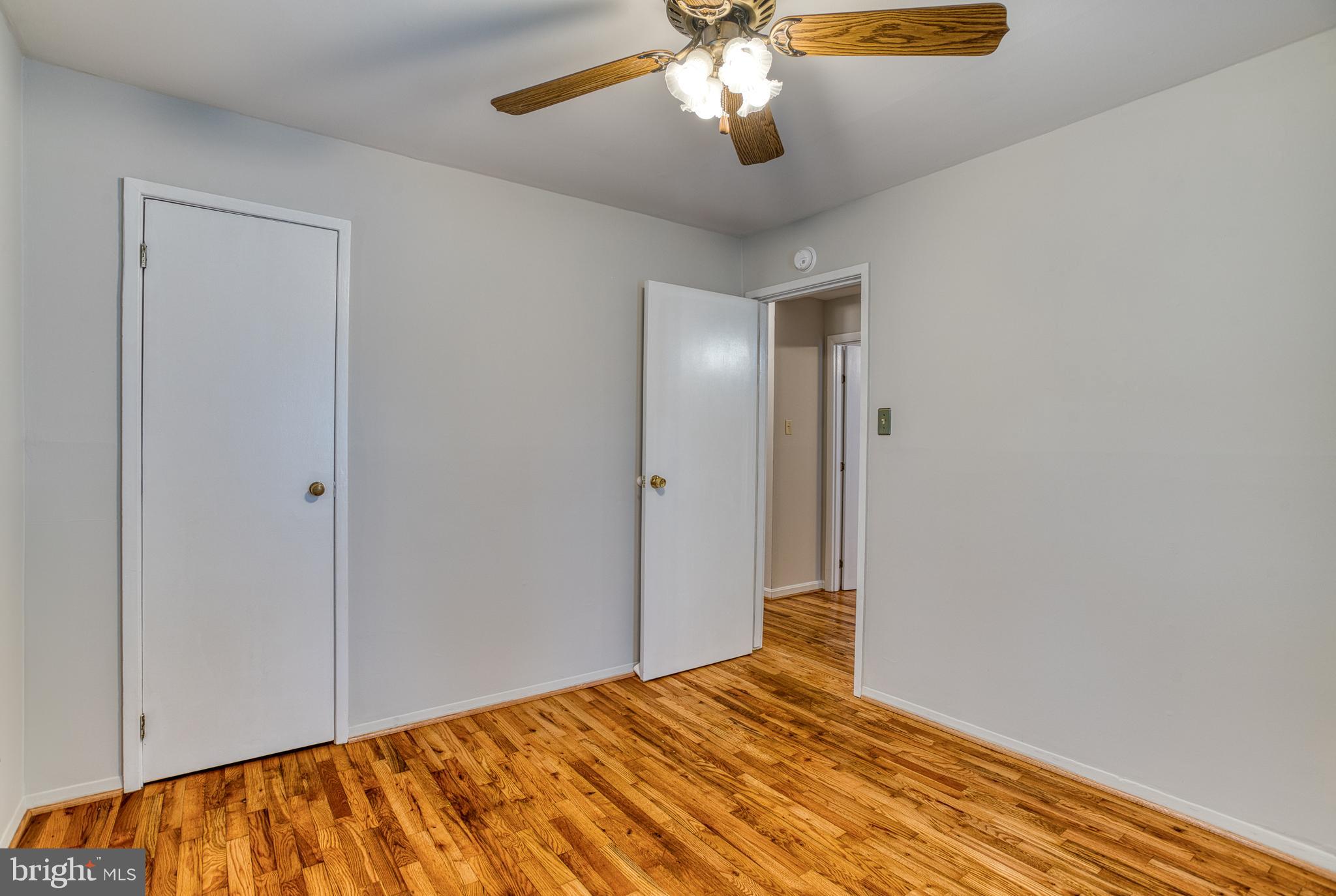 3565 Maple Street Dumfries, VA 22026 - Photo 17 of 36 a view of empty room with wooden floor