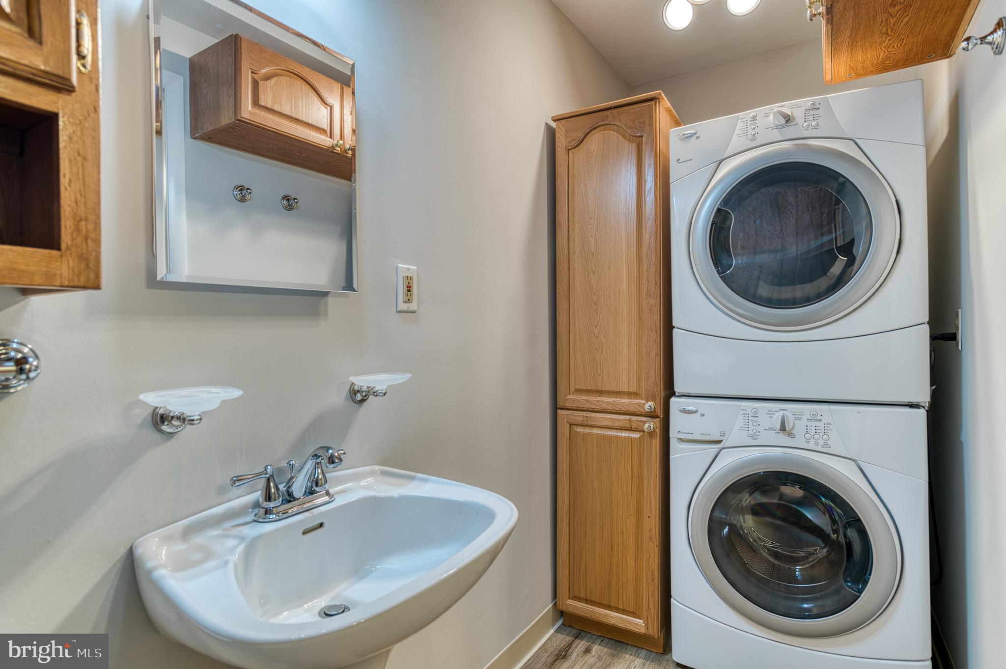 3565 Maple Street Dumfries, VA 22026 - Photo 22 of 36 a bathroom with a sink and a mirror