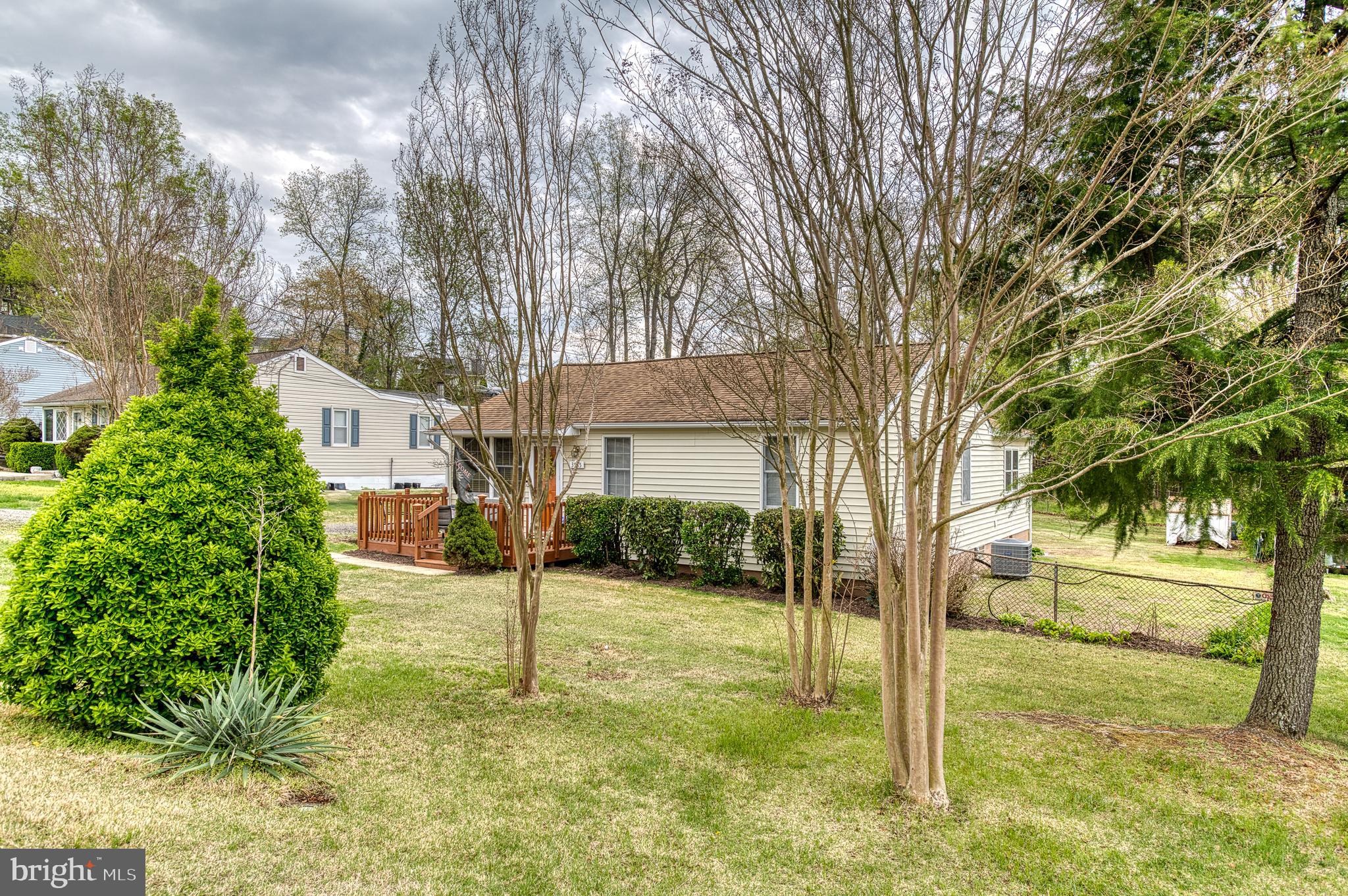 3565 Maple Street Dumfries, VA 22026 - Photo 29 of 36 a view of a house with a yard