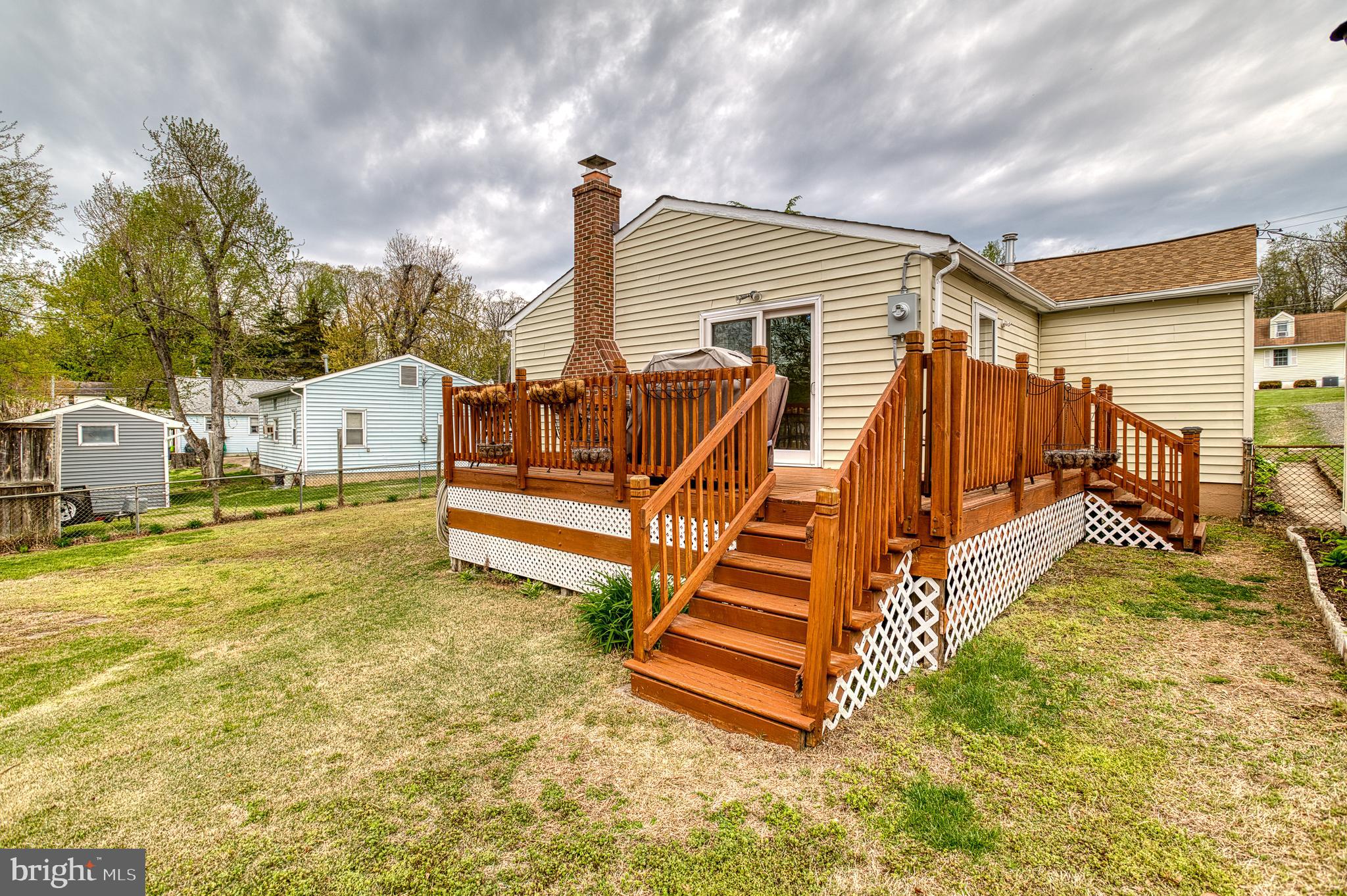 3565 Maple Street Dumfries, VA 22026 - Photo 3 of 36 a view of house with backyard and deck