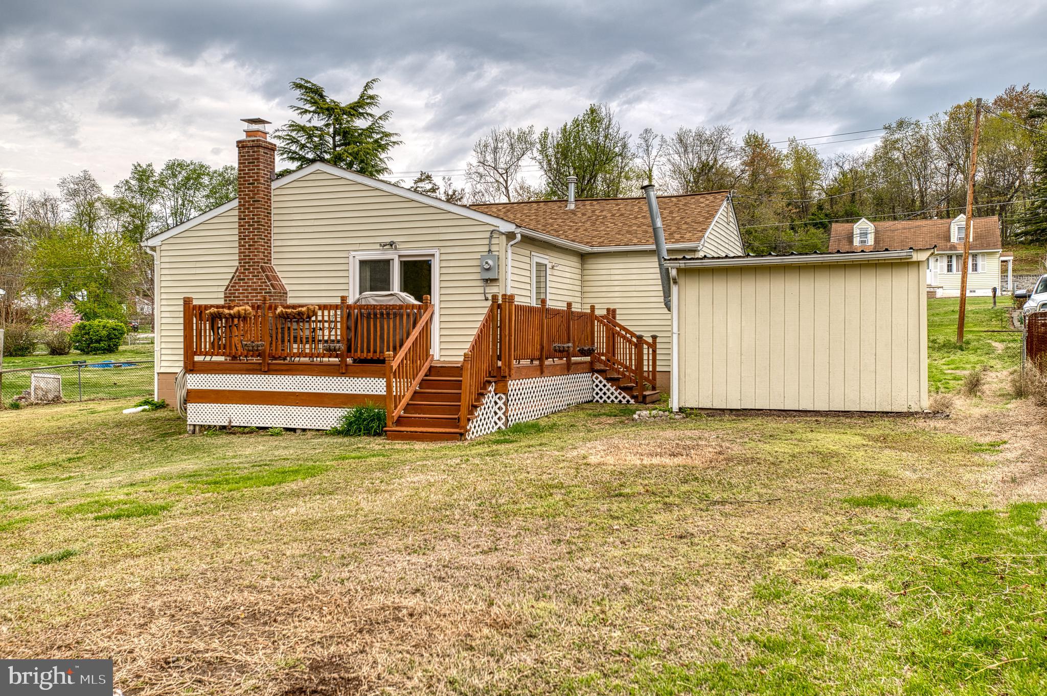 3565 Maple Street Dumfries, VA 22026 - Photo 32 of 36 a view of a house with a yard and sitting area