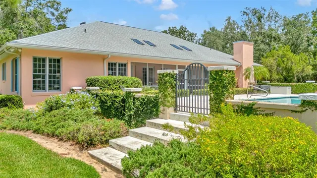 a view of a livingroom with furniture and a window